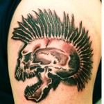 Exploited Skull Tattoo