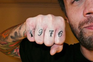 1976 finger tattoo