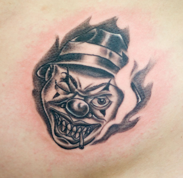 jester tattoos, gargoyle tattoos, clown tattoos, killer tattoos